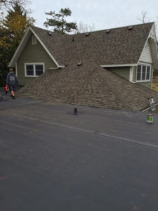 man walking on flat roof